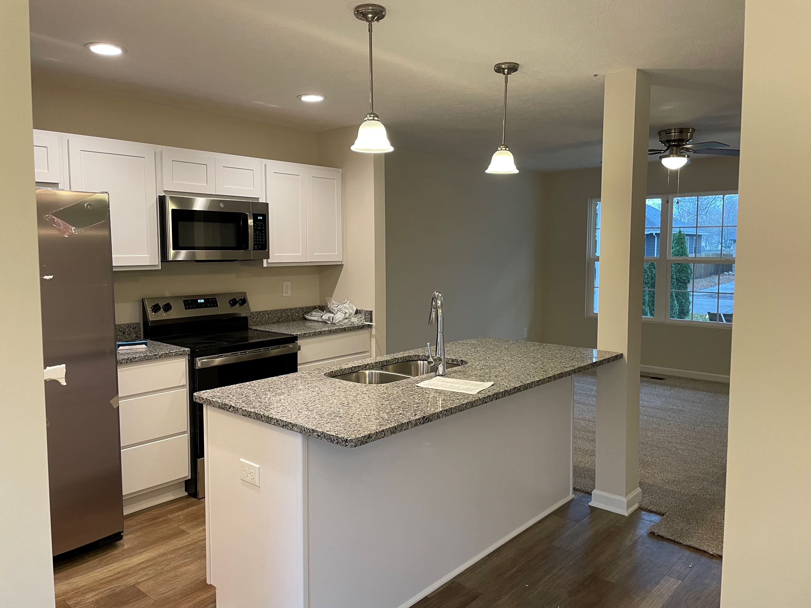 Paragon House Plan kitchen and living room